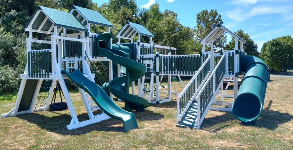 vinyl swingset with slides, climbers, swings and more