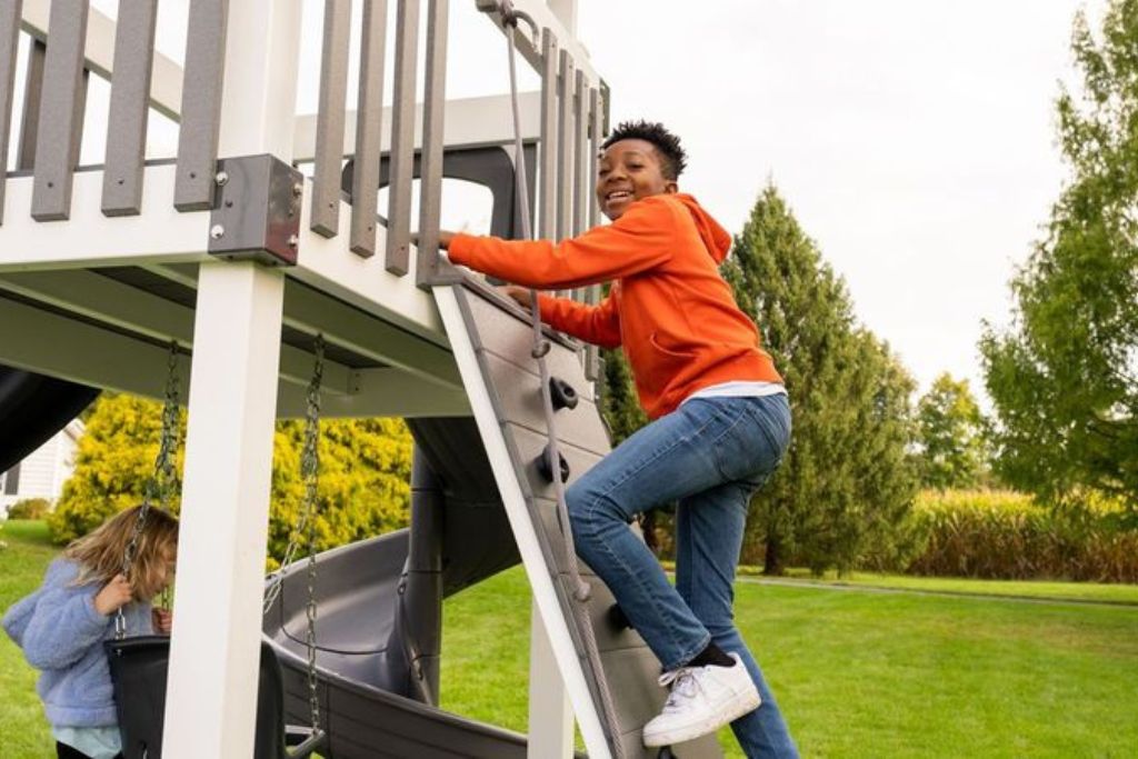 Cleaning a Playground Rock Wall for Kids