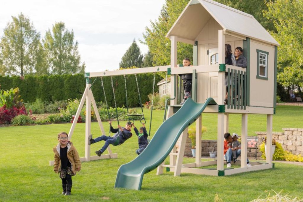 Sandbox in a swingset playground for backyard fun