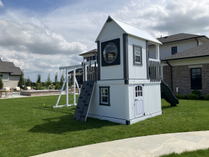 white clubhouse under vinyl swingset and playhouse