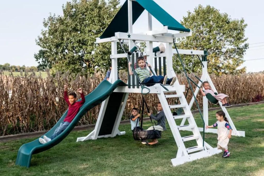 Outdoor climbing playground model with slide, rock wall, ladder, and more