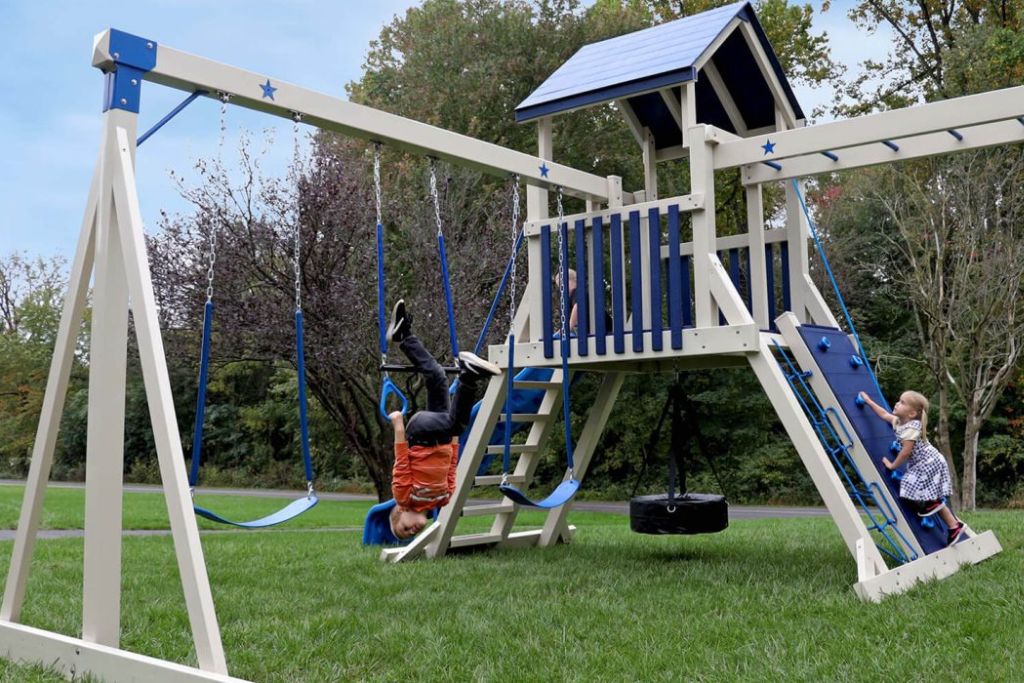 Vinyl Playset - Comet shown in blue with swings and monkey bars